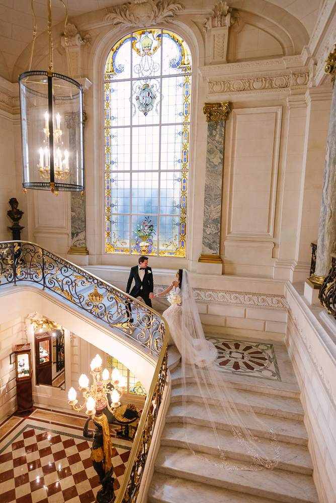 Couple photos on the staircase of Shangri La during Paris elopement